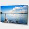 Designart - Small Wooden Boat and Tree Trunk - Extra Large Seashore Canvas Art